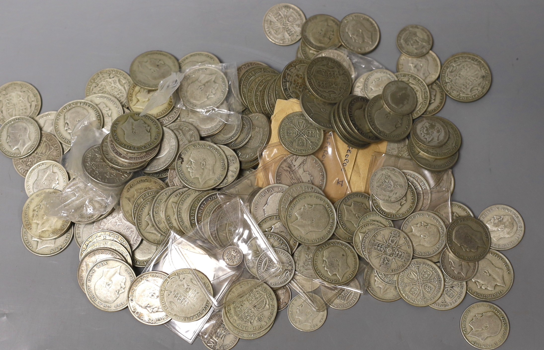 UK coins, a large collection of Victoria to George V silver and 50% silver half crowns, florins, shillings etc. , the majority post 1920 George VI half crowns